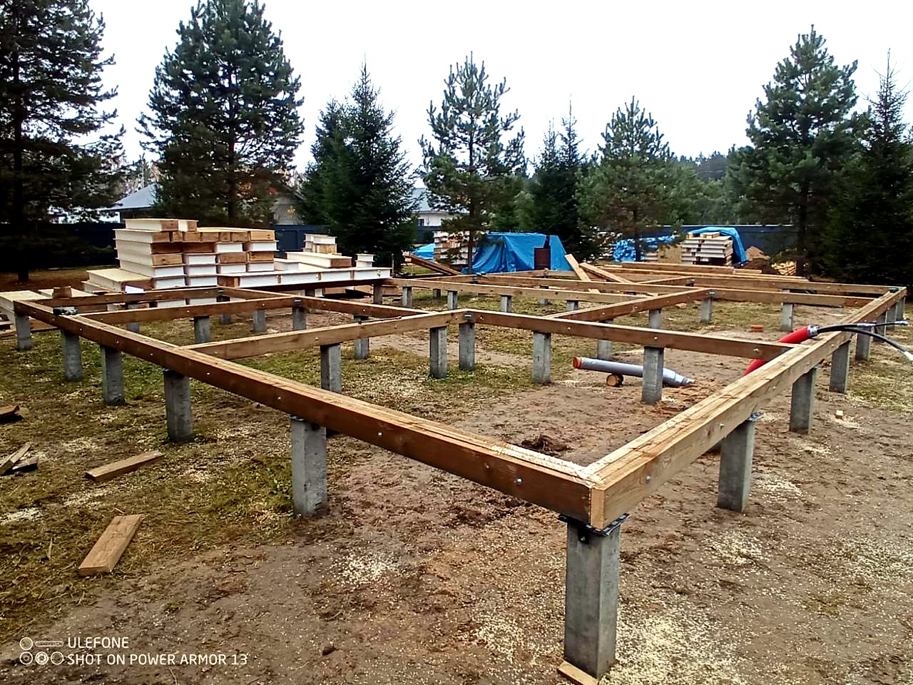 House built to a custom design, Svetloe village: foundation and sill strapping