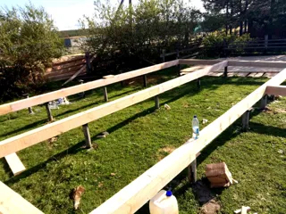 House built to a custom design, Arkhangelsk Region: foundation and sill strapping