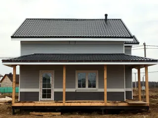Haus nach individuellem Entwurf, Siedlung Pervyy: fertiges Gebäude
