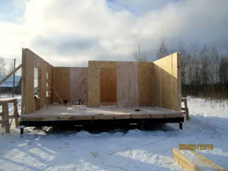 House based on the “Avdeevo” design, Molodtsovo settlement: wall assembly