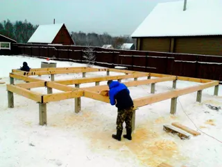 House built to a custom design, Patrikeevo village: foundation and sill strapping
