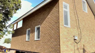 Haus nach Projekt „Sarja“, Kazan: Fassadenverkleidung
