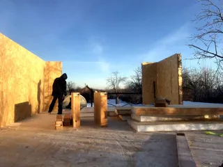 House based on the “Slavyanskiy Skit” design, Kadnikovo village: wall assembly