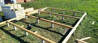 House built to a custom design, Nastasino village: foundation and sill strapping