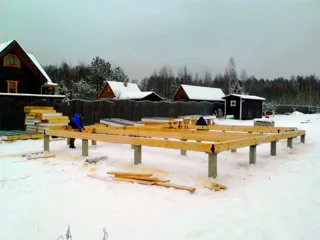 House built to a custom design, Patrikeevo village: foundation and sill strapping