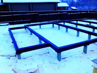 House built to a custom design, Patrikeevo village: foundation and sill strapping