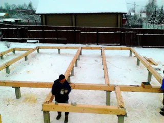House built to a custom design, Patrikeevo village: foundation and sill strapping