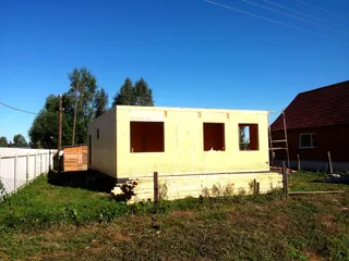 House based on the “Vanessa” design, Koloksha settlement: wall assembly