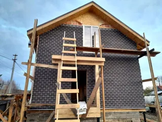 107 m² house built to a custom design, Shuya: facade finishing