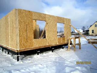 House based on the “Avdeevo” design, Molodtsovo settlement: wall assembly