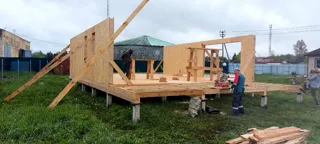 House based on the “Barnhouse 76.1” design, Zaporozhskoe settlement: wall assembly