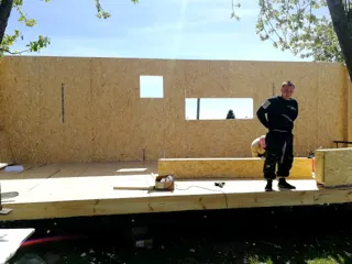 House based on the “Ochag” design, Starkovo village: wall assembly