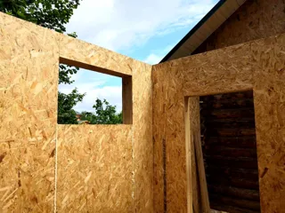 Custom-design extension, Uvod village: wall assembly