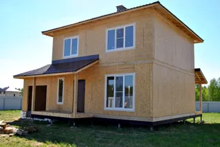 Haus nach Projekt „Slawjanka mini + Garage“, Siedlung Tunoshna