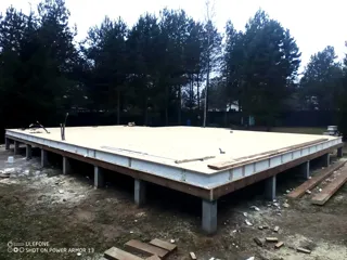 Custom-design house, Svetloe village: SIP panel floor at elevation 0