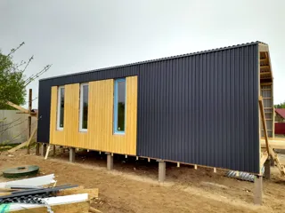 House based on the “Barnhouse 33” design, Novonikolskoe village: completed house