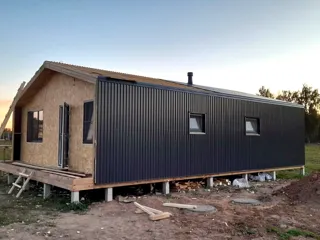 Haus nach Projekt „Barnhouse 65“, Dorf Kryukovo: Fassadenverkleidung
