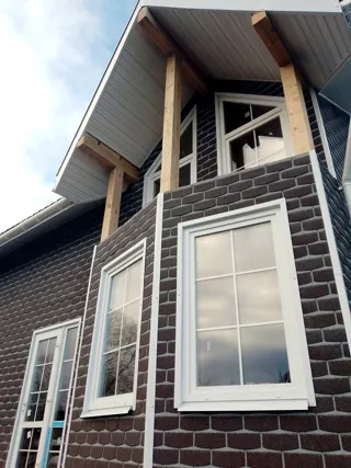 107 m² house built to a custom design, Shuya: facade finishing