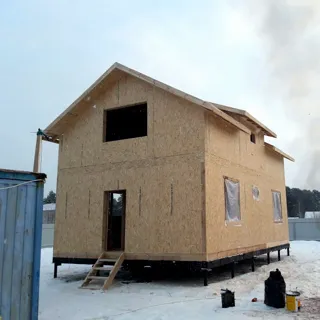 Custom-design house, Ishnya settlement: finished building