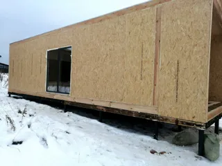 “Ochag” projesine göre ev, Sokolovo köyü: duvar montajı