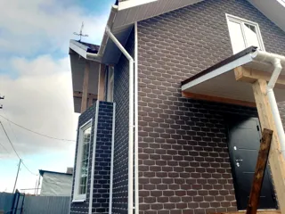 107 m² house built to a custom design, Shuya: facade finishing