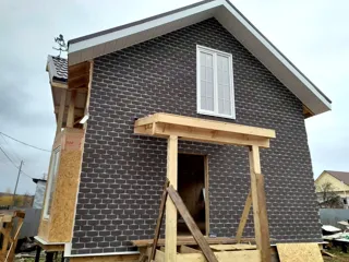 107 m² house built to a custom design, Shuya: facade finishing