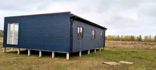Haus 102 m² nach Projekt „Mistika - D“, Dorf Khrabrovo: Fassadenverkleidung