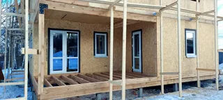 Custom-design house, Yadrominskoe village: wall assembly