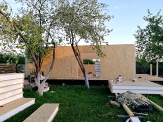 House based on the “Ochag” design, Starkovo village: wall assembly