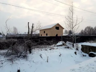 Custom-design house, Ishnya settlement: finished building