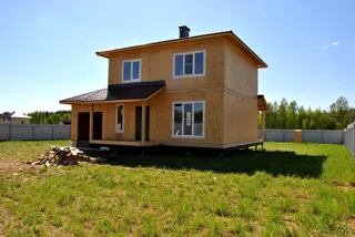 Haus nach Projekt „Slawjanka mini + Garage“, Siedlung Tunoshna: Fertiges Haus
