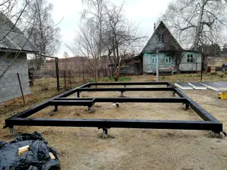 House built to a custom design, Nikulskoe village: foundation and sill strapping