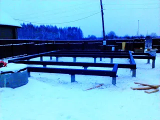 House built to a custom design, Patrikeevo village: foundation and sill strapping