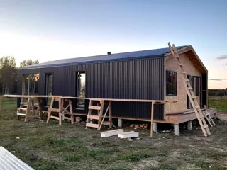 Haus nach Projekt „Barnhouse 65“, Dorf Kryukovo: Fassadenverkleidung