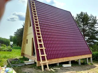 “A-Frame 57” projesine göre ev, Poddubnovo köyü: duvar montajı