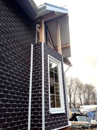 107 m² house built to a custom design, Shuya: facade finishing