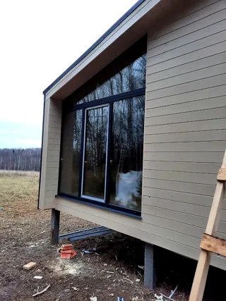 Haus nach Projekt „Barnhouse 110“, Dorf Syanovo-2: Fassadenverkleidung